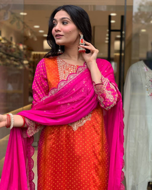 Multicoloured bandhni print with mirror work and print lace